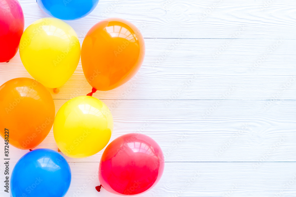 Flat lay with ballons - party concept - on white background top-down copy space Flat lay with ballons - party concept - on white background top-down copy space