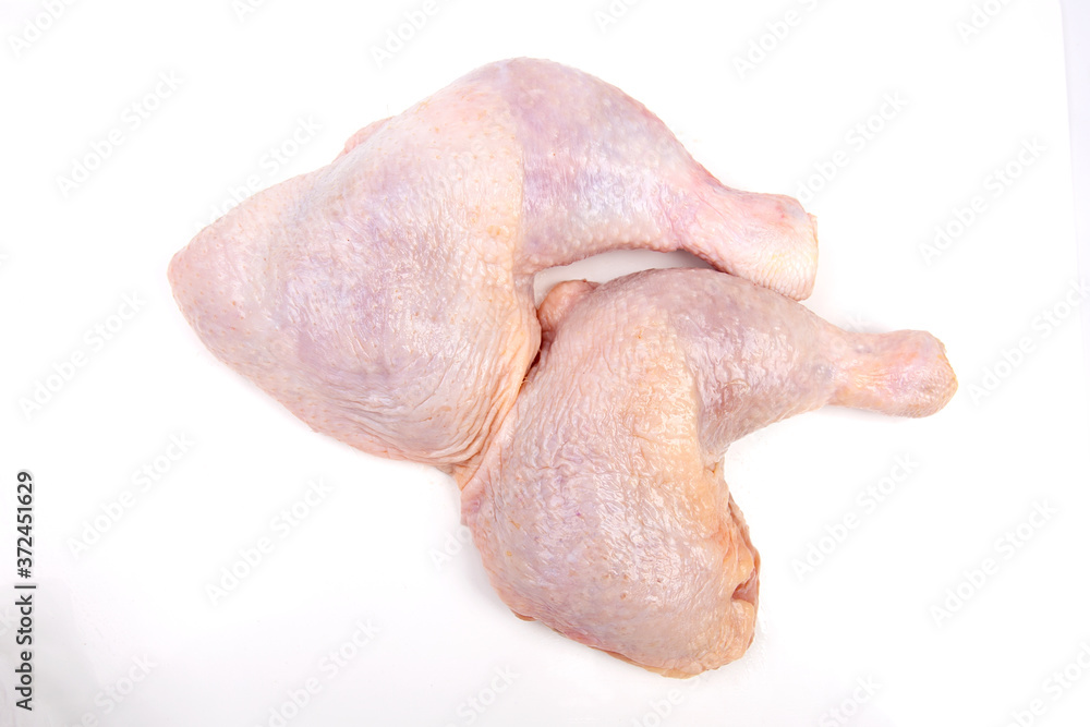 Raw chicken legs on a white background Raw chicken legs on a white background