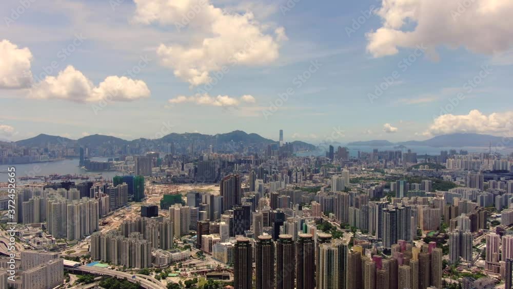 Hong Kong skyline with skyscrapers and bay view on a beautiful clear day, Aerial view. Hong Kong skyline with skyscrapers and bay view on a beautiful clear day, Aerial view.