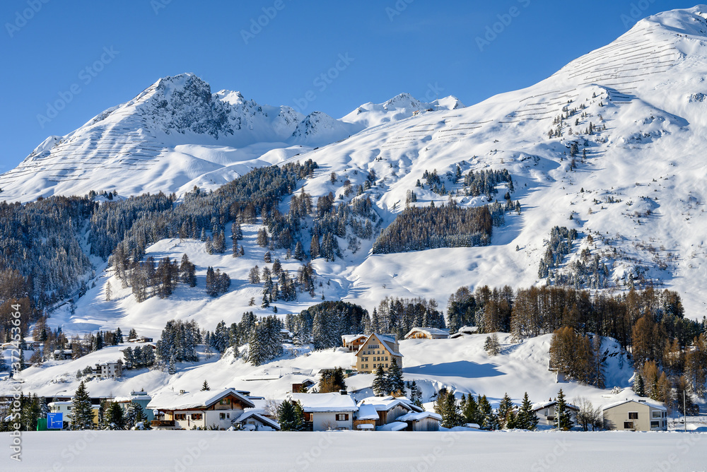 Landscape of lake Davos in winter resort Davos, Switzerland.