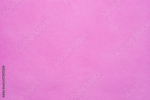 Paper background. The texture of the pink paper. An empty page with a copy of the space.