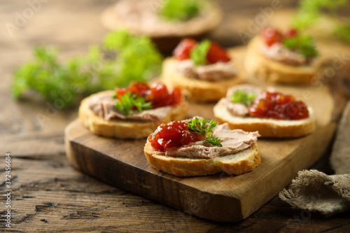 Traditional homemade pate on toast with jam