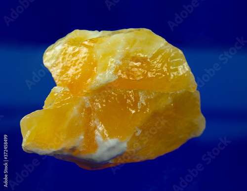Orange calcite from Madagascar. Natural minerals. Look so real that you would most like to eat it.