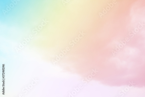 Sky and clouds fantasy background with pastel colored. Yellow,pink, purple, green candy pastel. Abstract gradient of peaceful nature. Beautiful summer and spring.