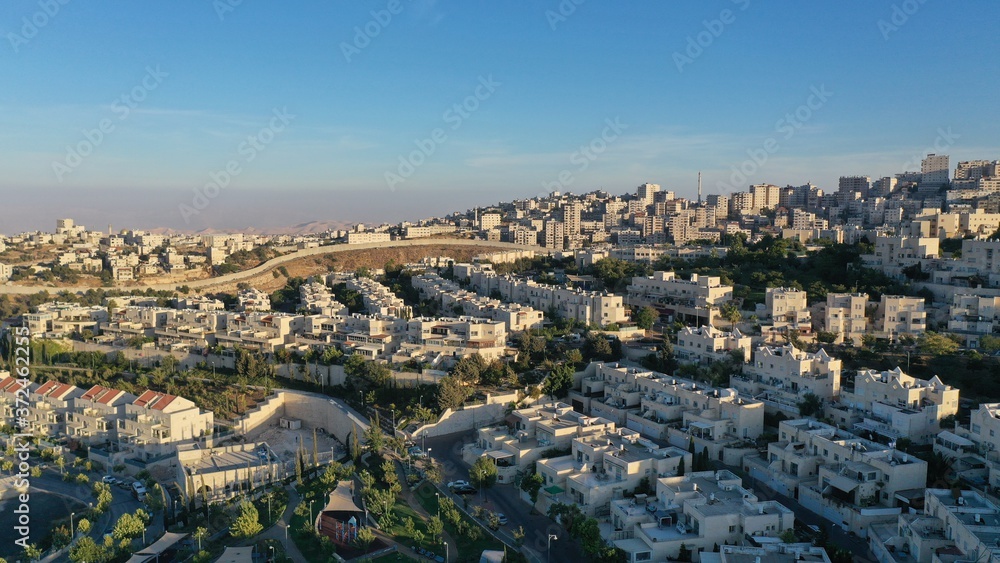Israel and Palestine town divided by wall, aerial
pisgat zeev and anata refugees camp, Jerusalm israel
