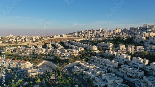 Israel and Palestine town divided by wall, aerial pisgat zeev and anata refugees camp, Jerusalm israel  © ImageBank4U