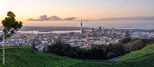 Auckland city skyline with Auckland Sky Tower from Mt. Eden at sunset New Zealand photo