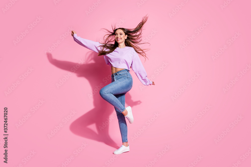 Full size profile side photo of candid satisfied girl enjoy rejoice free time raise hand wear good look mood clothes haircut air wind isolated pink color background