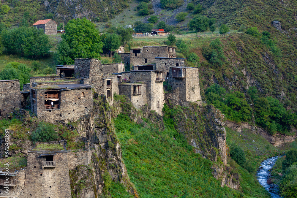 Old Fortress in mountain village Shatili, ruins of medieval castle