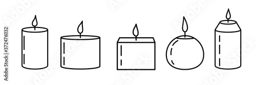 Set of candle icons on white background. Isolated aromatic candles whith flame. Vector illustration in flat style.