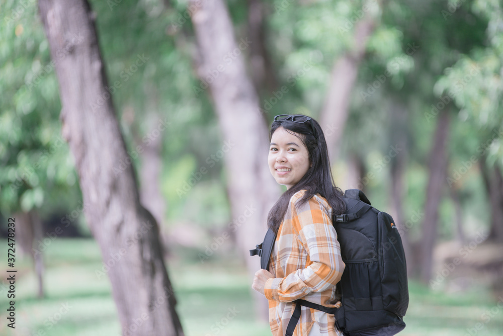 Teenager women backpackers traveling to nature, starting the tourist season Teenager women backpackers traveling to nature, starting the tourist season