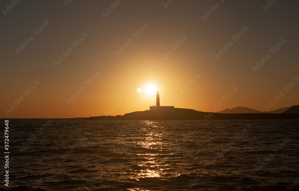 lighthouse in Ibiza, Spain during sunset
