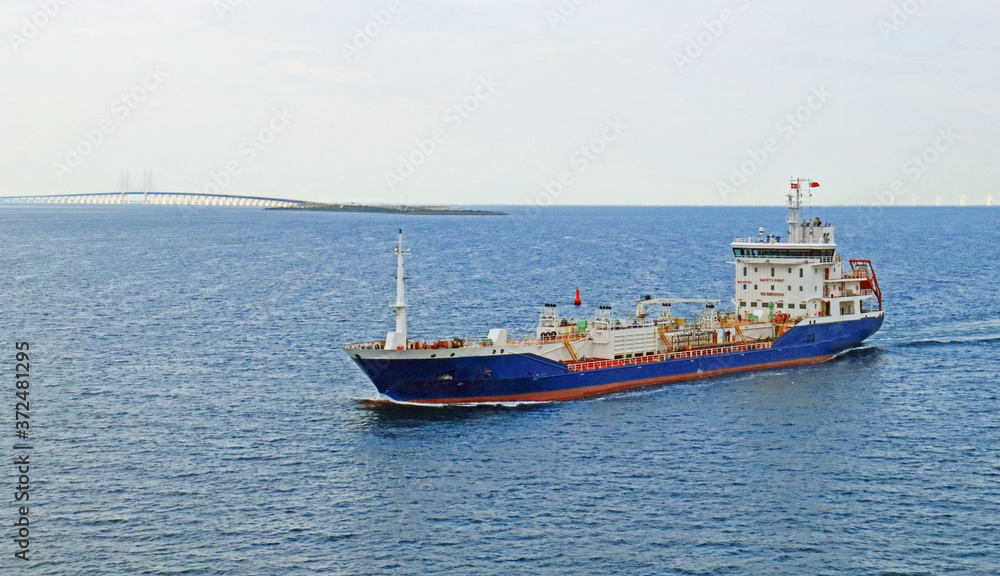 tanker Nike with Denmark to Sweden bridge in background tanker Nike with Denmark to Sweden bridge in background