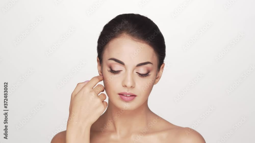 Studio portrait of young and beautiful brunette woman Studio portrait of young and beautiful brunette woman