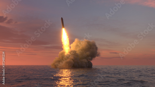 Ballistic missile launch from underwater at sunset
