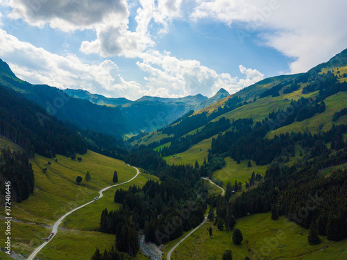 Aerial view into the valley head of the Hinterglemm Mountains on a summer day in the Alps at Saalbach-Hinterglemm, Austria.