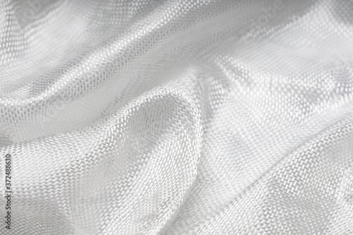 Close up of fiberglass cloth composed into a wrinkled pattern