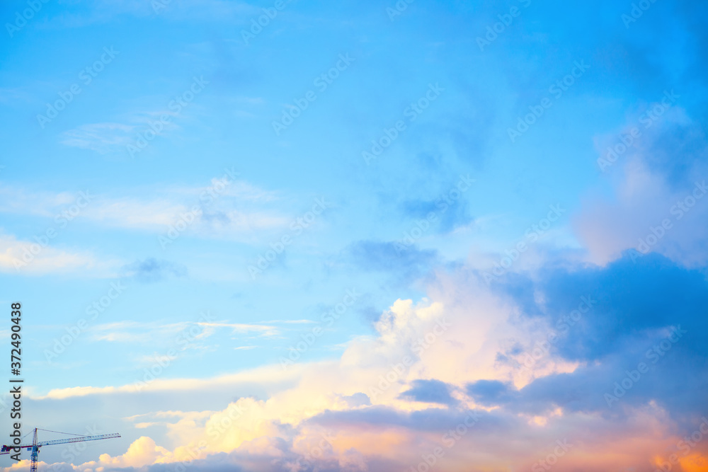 Crane in the skyline . Heaven in the dusk 