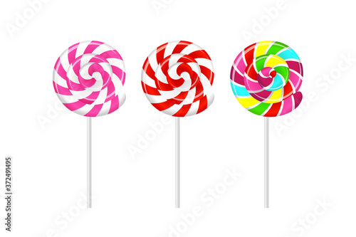 Set of realistic striped colorful lollipops on white sticks isolated on white background. Vector illustration.
