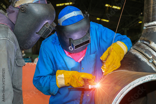Welding training, Apprentice welder in the factory by Tig gas inert process