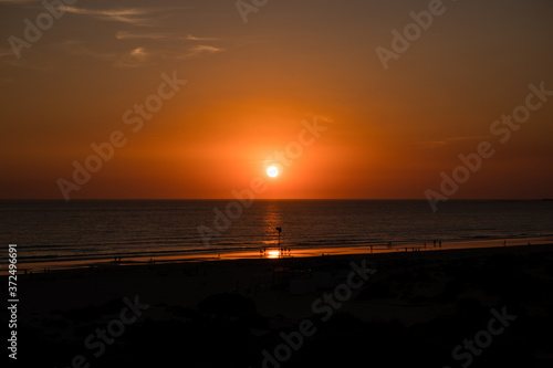 Sunset at La Barrosa beach in Sancti Petri, Cadiz, Spain © josevgluis