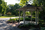 Beautiful Wood Gazebo at Dellwood Park in Lockport Illinois with Green Trees and Shade during the Summer