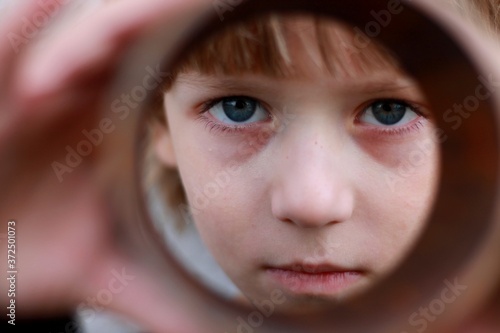 Wallpaper Mural little boy looking through magnifying glass Torontodigital.ca