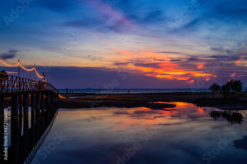 Landscape or seascape view with sunset or sunrise with sky and clouds © Vatcharachai
