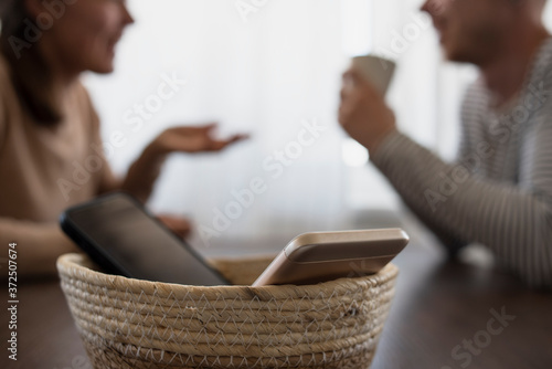 Bilde på lerret People on meeting without their phones. Digital detox, basket
