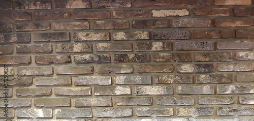 Brown-colored spotted block wall_background