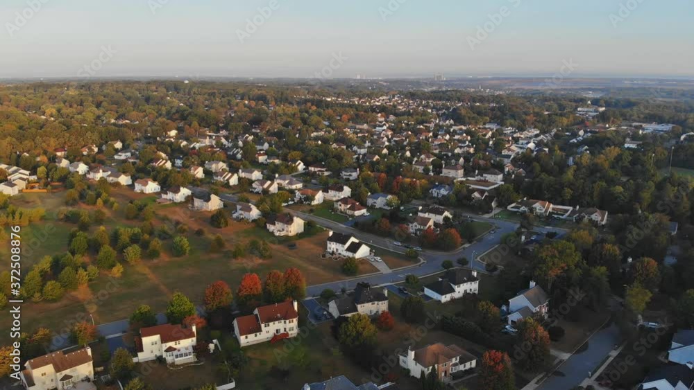 A houses urban landscape of small town from a height suburban neighborhood with roofs A houses urban landscape of small town from a height suburban neighborhood with roofs