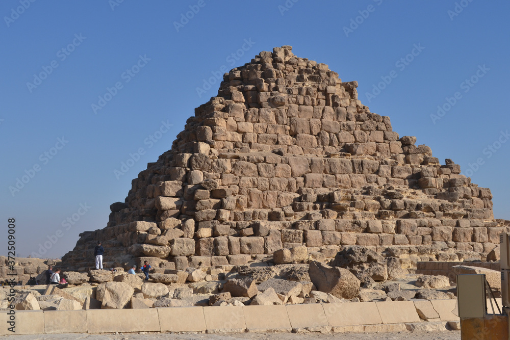 The golden sandstone of the Great Pyramid of Giza, Egypt, and the blue sky