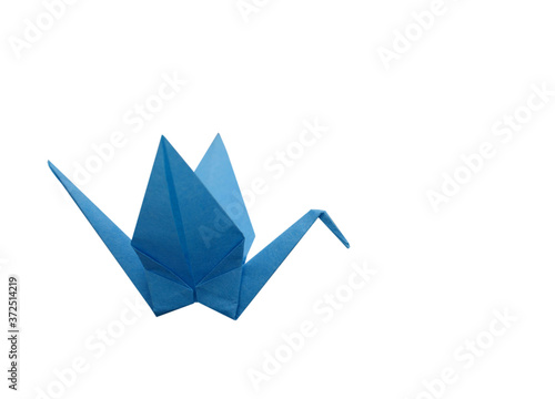 A blue origami paper bird isolated white
