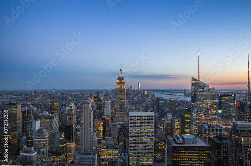 New York skyline at sunset with city lights © Volker Linck