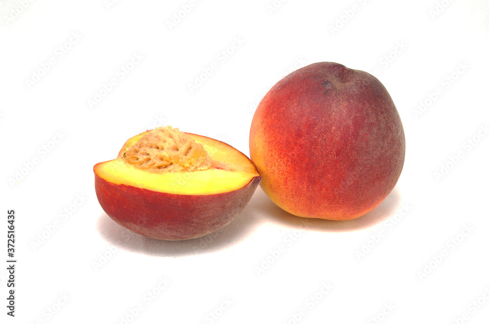 Ripe juicy peach on white background close up
Ripe juicy peach on white background close up
