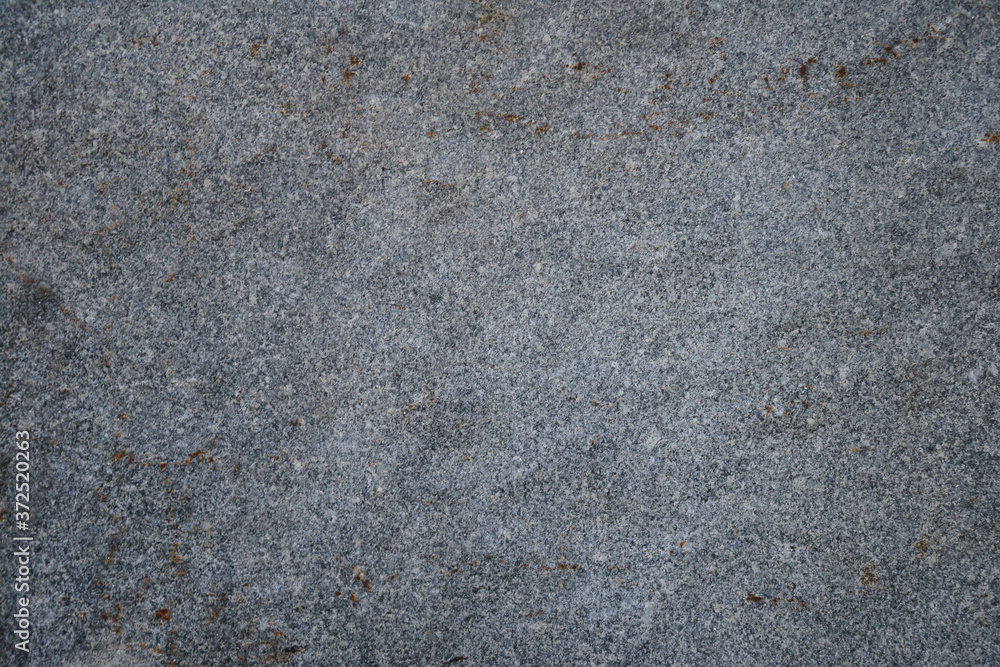 Background of a photo of a granite wall in gray-blue color Background of a photo of a granite wall in gray-blue color