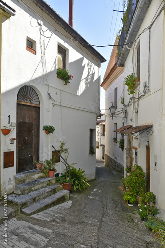 A narrow street among the old houses of Aieta, a rural village in the Calabria region.