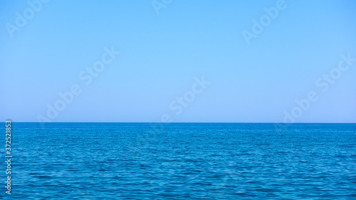 Sea horizon and blue serene sky