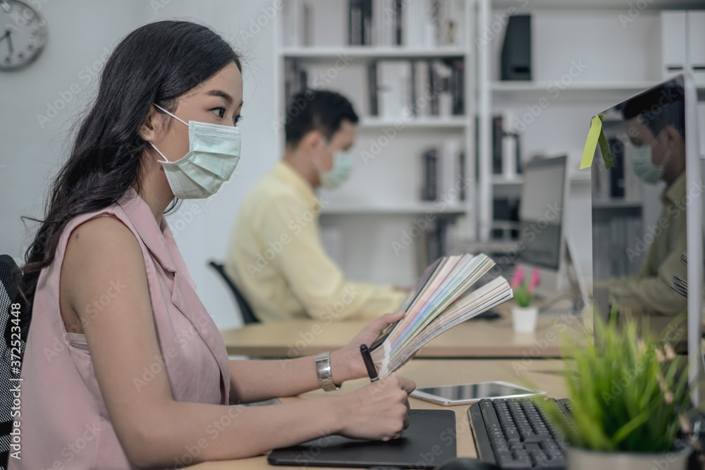 Business work in office with face mask social distancing quarantine during COVID19 affect Business work in office with face mask social distancing quarantine during COVID19 affect