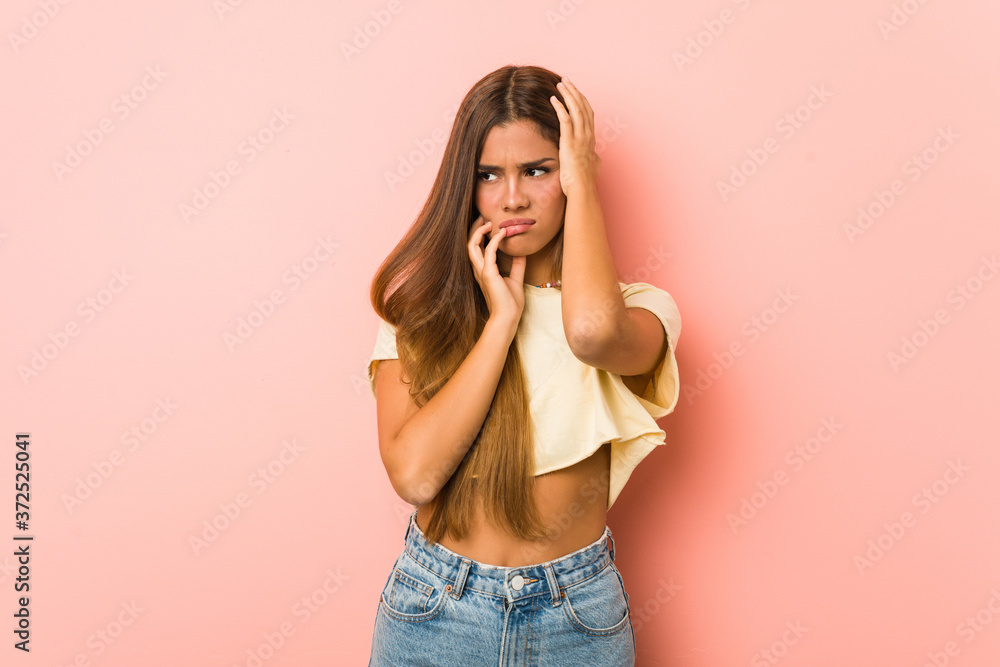Young slim woman whining and crying disconsolately. Young slim woman whining and crying disconsolately.