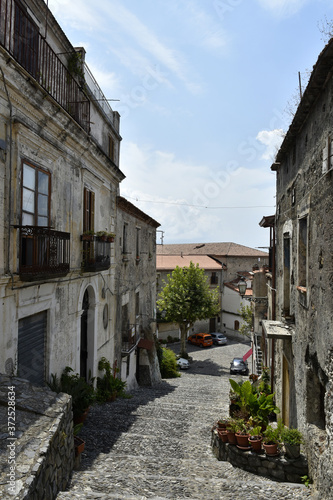 A narrow street among the old houses of Scalea  a rural village in the Calabria region  Italy.