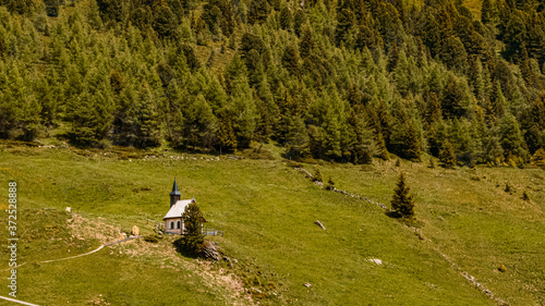 Fototapeta Naklejka Na Ścianę i Meble -  Beautiful alpine view with a small chapel at the famous Zillertaler Hoehenstrasse, Tyrol, Austria