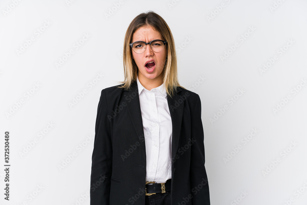 Young business caucasian woman screaming very angry and aggressive. Young business caucasian woman screaming very angry and aggressive.