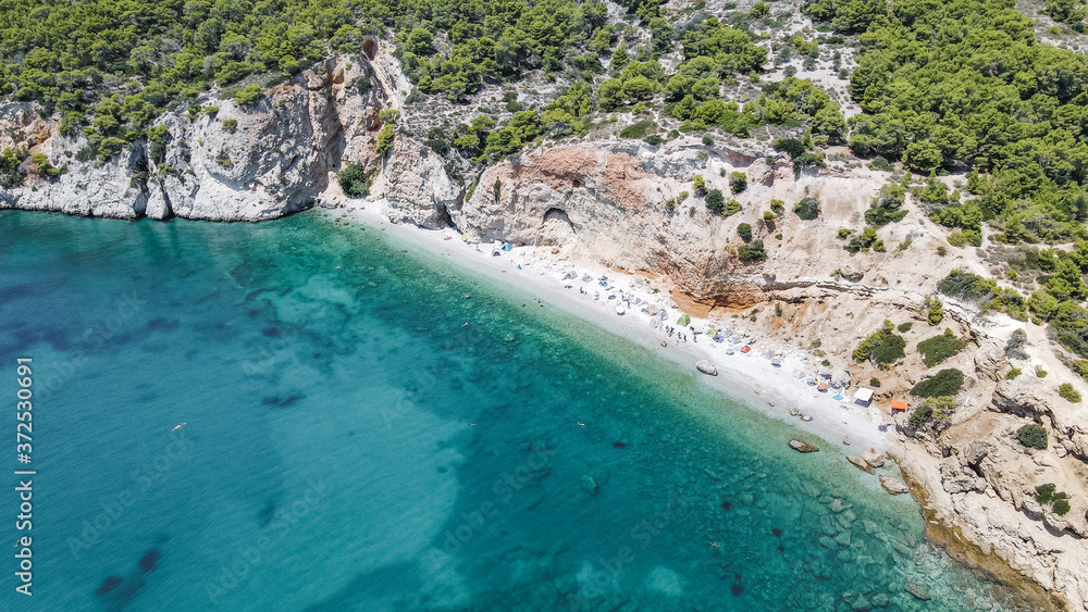 Chalikiada beach in Agistri coastline with blue water, little bay on a