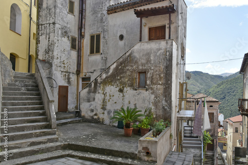 A narrow street among the old houses of Tortora  a rural village in the Calabria region  Italy.