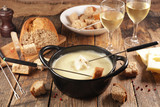 cheese fondue with bread and wine