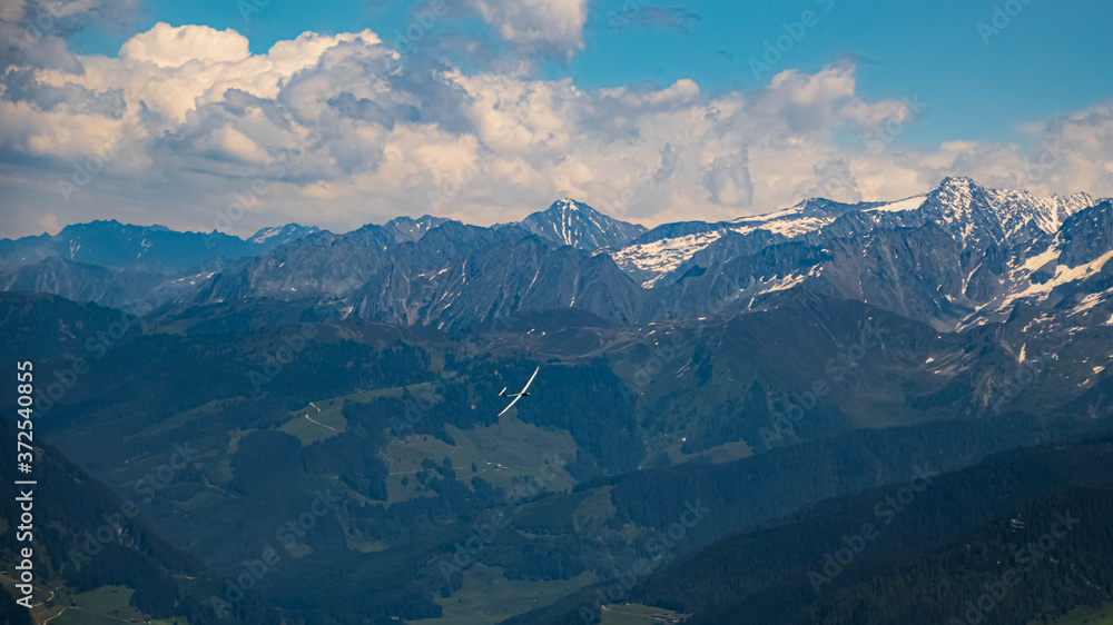 Beautiful alpine view with a glider at the famous Zillertaler Hoehenstrasse, Tyrol, Austria