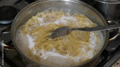 Wallpaper Mural Cooked spaghetti pasta and foaming during cooking Torontodigital.ca