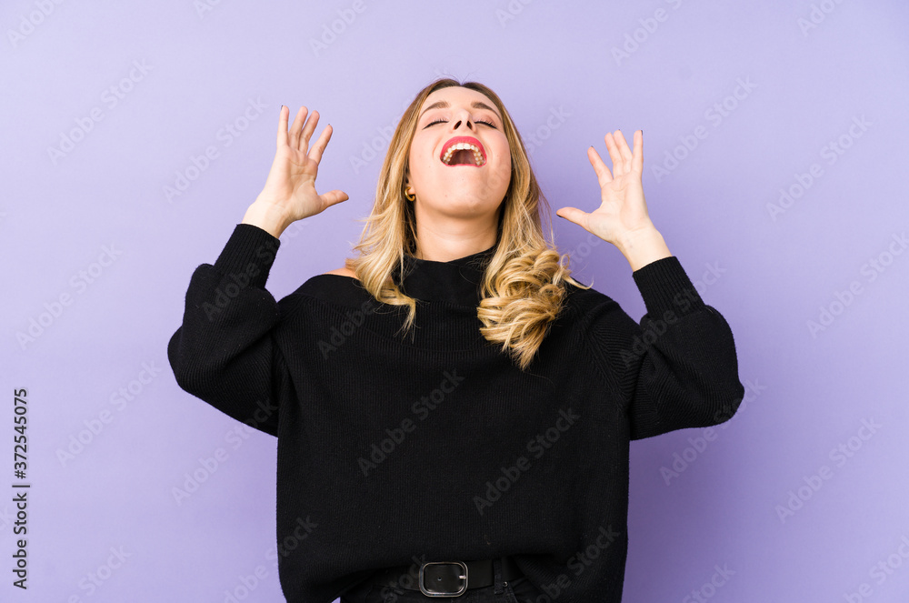 Young blonde woman isolated screaming to the sky, looking up, frustrated. Young blonde woman isolated screaming to the sky, looking up, frustrated.