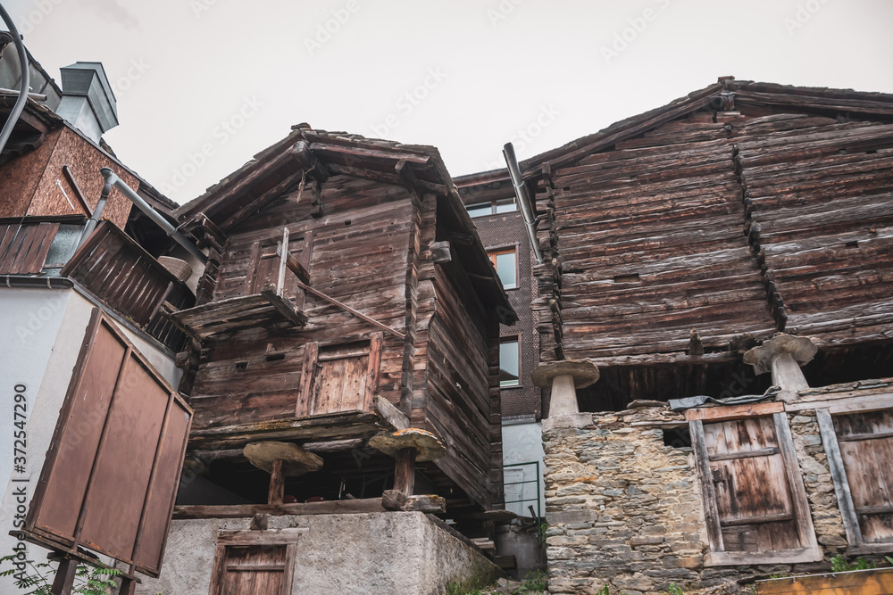 Special historical construction of old log cabins in Swiss mountains alps.